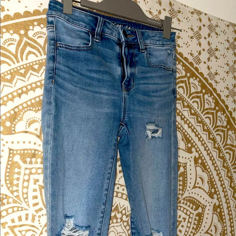 ✨HP✨ “AMERICAN EAGLE” NEXT LEVEL HI-RISE BLUE RIPPED JEGGING, LADIES SZ 2 SHORT - Picture 5 of 9
